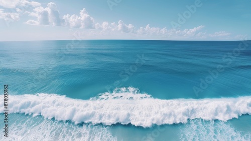 Expansive ocean view, waves gently rolling, endless blue waters meeting the horizon, capturing the essence of marine tranquility photo