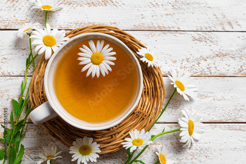 Chamomile tea and chamomile buds photo