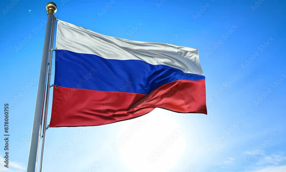A flag with the colors red, white and blue. The flag is flying in the sky A flag with the colors red, white and blue. The flag is flying in the sky