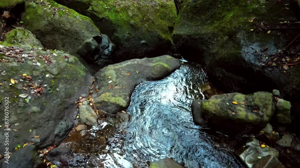 Drone shot Clear river water flow, Dolo waterfall area river, Kediri, Indonesia Drone shot Clear river water flow, Dolo waterfall area river, Kediri, Indonesia