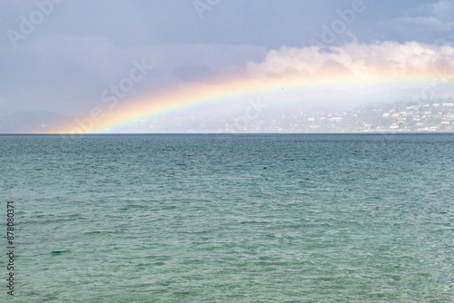 Arc-en-ciel pendant l'orage sur le lac Léman