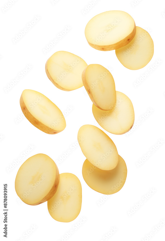 Isolated potato pieces in the air. Unpeeled slices of raw washed potato falling down over white background Isolated potato pieces in the air. Unpeeled slices of raw washed potato falling down over white background