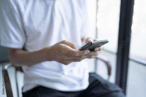 Man hold smartphone modern technology engagement in daily life