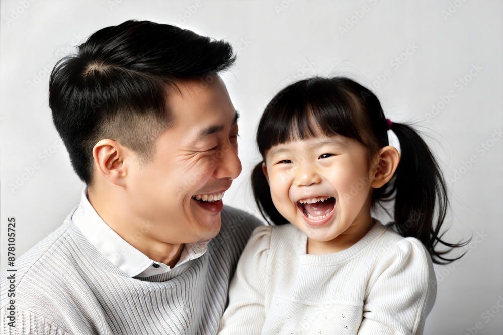 Close-Up of Asian Father and Daughter Laughing
Close-Up of Asian Father and Daughter Laughing