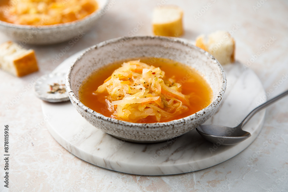 Homemade sauerkraut soup served with bread Homemade sauerkraut soup served with bread