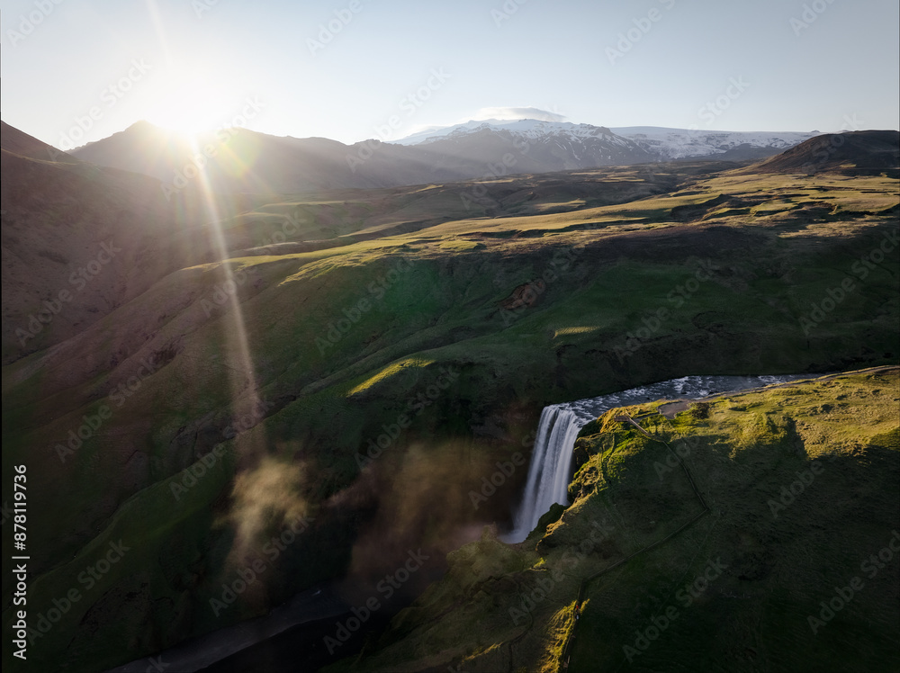 View from above, stunning aerial view of the spectacular Skógafoss Waterfall at sunset. Skógafoss is one of the biggest waterfalls in Iceland.