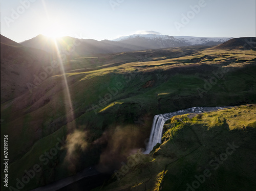 Obraz na płótnie View from above, stunning aerial view of the spectacular Skógafoss Waterfall at sunset. Skógafoss is one of the biggest waterfalls in Iceland. w salonie