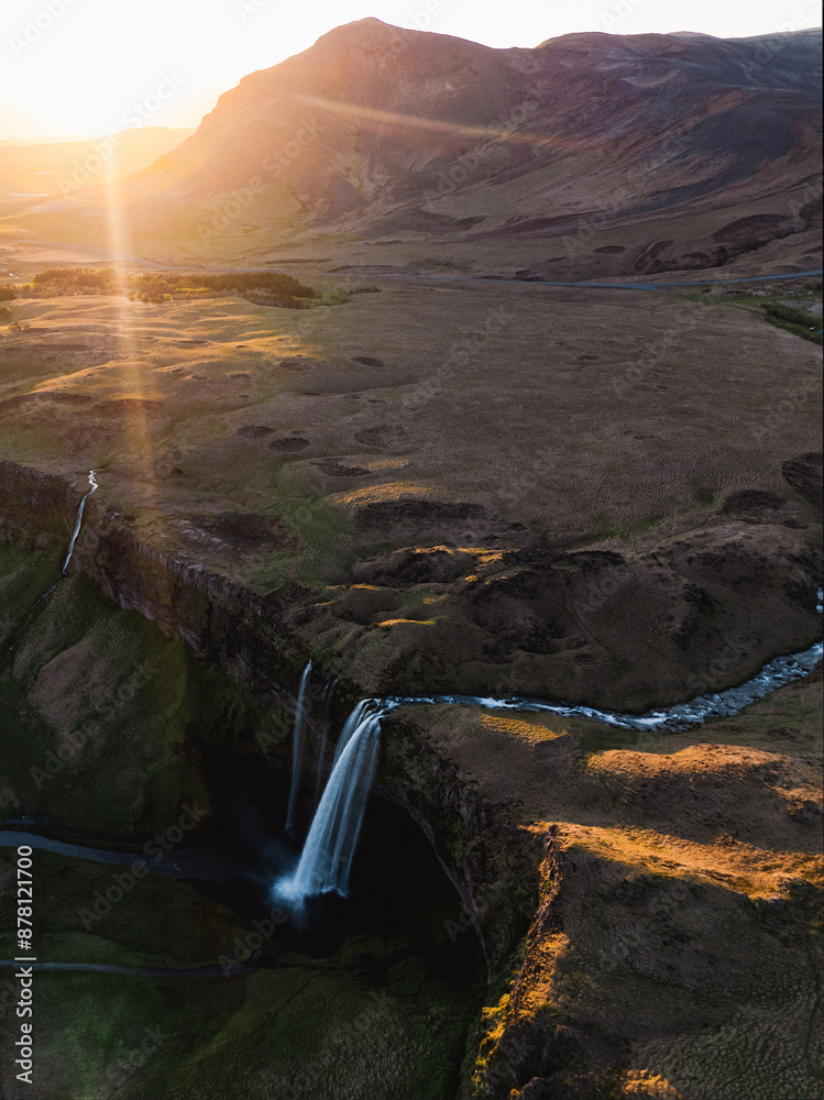 View from above, stunning aerial view of Seljalandsfoss waterfall at sunset. Seljalandsfoss is one of the most impressive waterfalls in the country. Iceland.