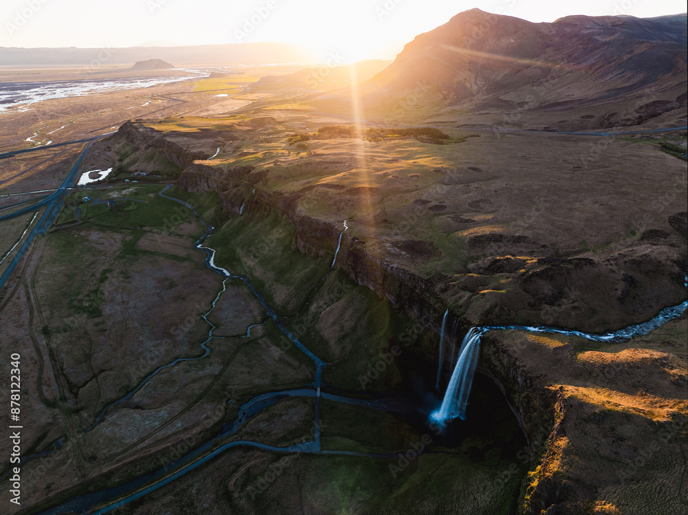 View from above, stunning aerial view of Seljalandsfoss waterfall at sunset. Seljalandsfoss is one of the most impressive waterfalls in the country. Iceland.