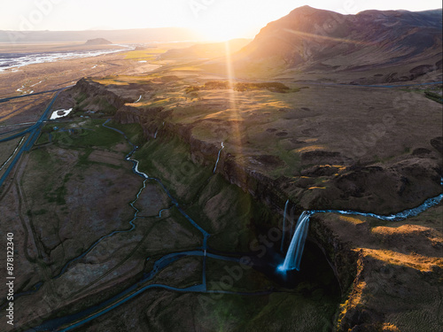 Obraz na płótnie View from above, stunning aerial view of Seljalandsfoss waterfall at sunset. Seljalandsfoss is one of the most impressive waterfalls in the country. Iceland. w salonie