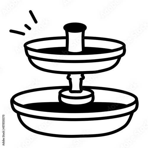 A doodle style icon of stopped garden fountain 