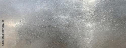 Obraz na płótnie A textured background of polished silver, abstract and sleek in appearance. w salonie