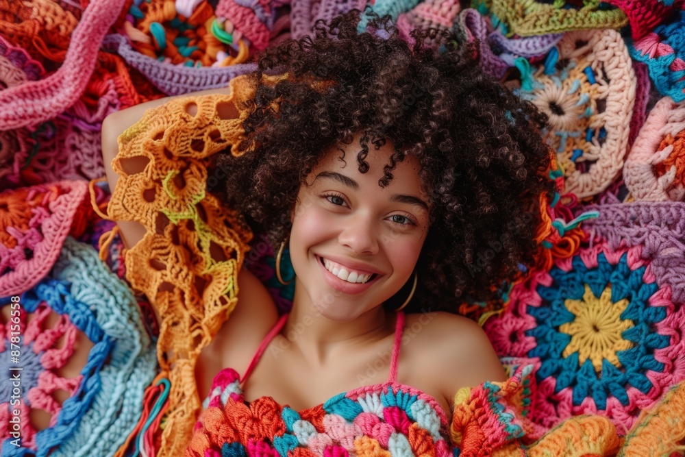 funky diverse young woman lying on crochet yarn in handmade crochet outfit smiling and looking to the camera - fiber art hobby funky diverse young woman lying on crochet yarn in handmade crochet outfit smiling and looking to the camera - fiber art hobby