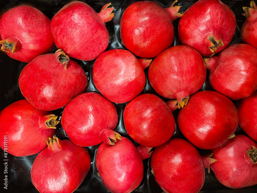 Group of pomegranates. Pomegranate closeup. Red pomegranate Background or wallpaper. Group of pomegranates. Pomegranate closeup. Red pomegranate Background or wallpaper.