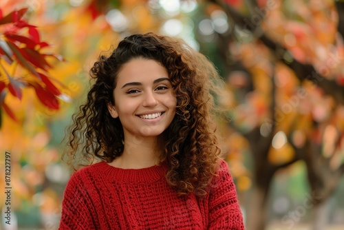 Radiant Smile Amidst Autumn Leaves