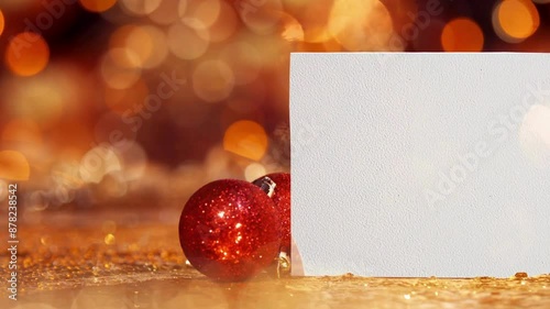 Video of christmas decorations, red stars with envelopes on white background. christmas, tradition and celebration concept.
