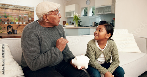 Bild auf Leinwand Family, child and grandfather with piggy bank in home for financial education, knowledge and learn to budget