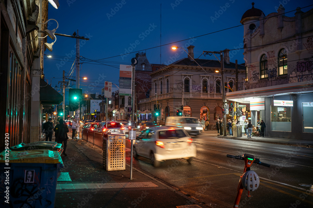 Obraz premium johnston street in melbourne at night on with night life in australia in summer