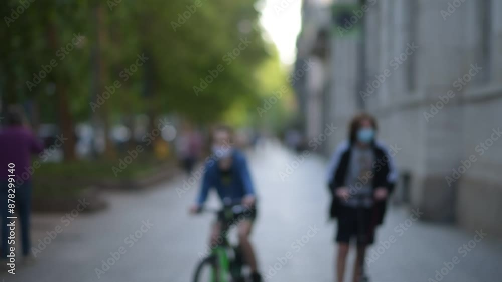 people walking in the park, blurry background, blurred urban life people walking in the park, blurry background, blurred urban life
