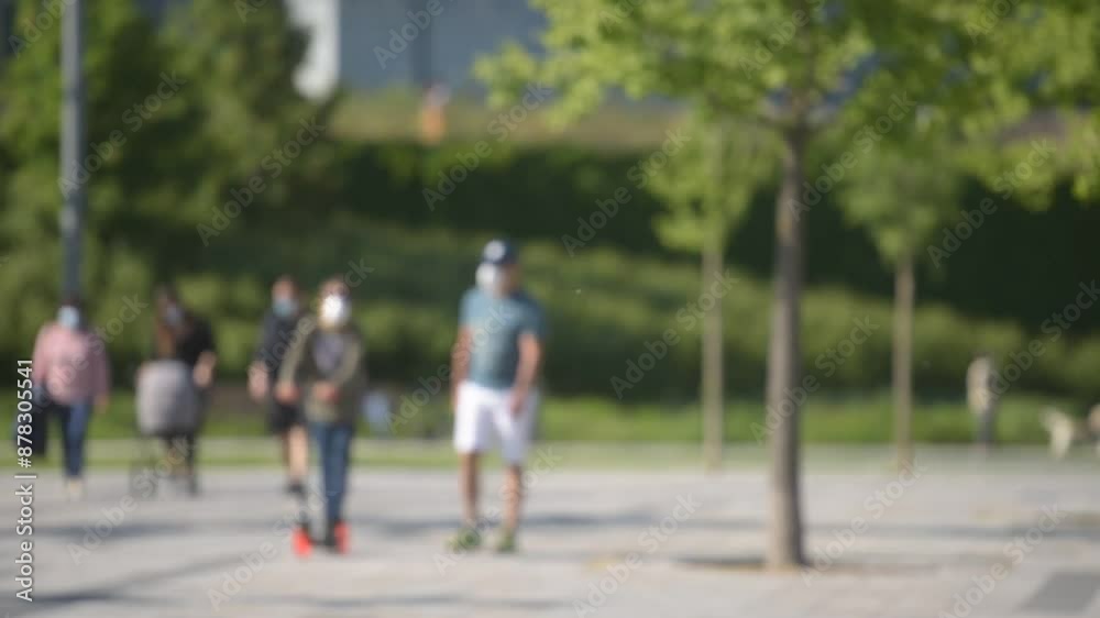 blurred people walking in the park, blurry city background, urban life scenery blurred people walking in the park, blurry city background, urban life scenery