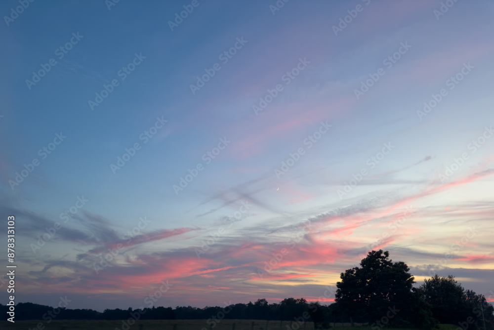 Fototapeta premium sunset over the farm