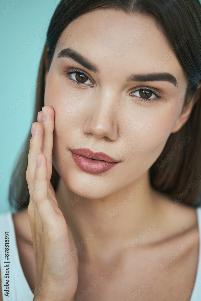 Natural Beauty. Young Woman With Clear Skin Touching Face, Expressing Skincare Routine. Perfect For Promoting Wellness, Cosmetics, And Beauty Products Natural Beauty. Young Woman With Clear Skin Touching Face, Expressing Skincare Routine. Perfect For Promoting Wellness, Cosmetics, And Beauty Products
