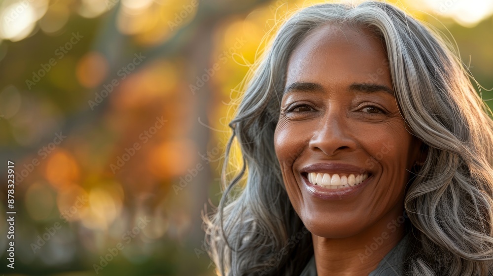 Radiant Mature Woman Enjoying Golden Hour in Nature Radiant Mature Woman Enjoying Golden Hour in Nature
