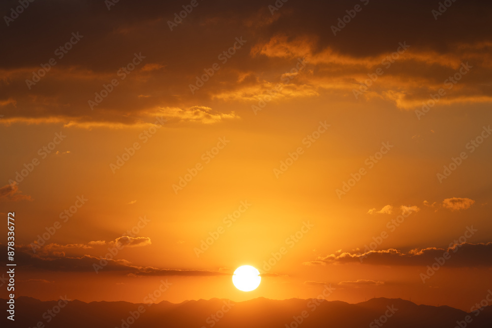 Beautiful sunset in the sky with clouds and sun. Nature background. Beautiful sunset in the sky with clouds and sun. Nature background.