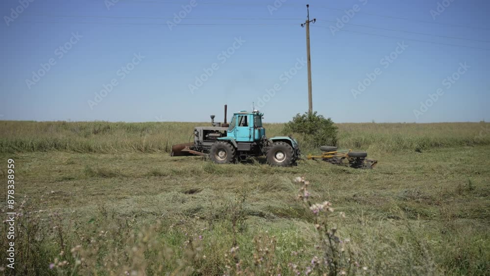 Tractor on field during agricultural work. Field work concept.