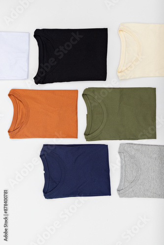 premium blank t-shirts, various colors, stacked, mockup, 100% cotton, basic collection, unbranded and unprinted