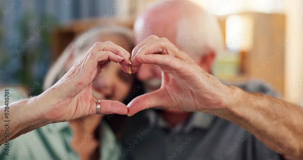Fototapeta premium Senior couple, hands and heart symbol in retirement home with smile for care, love and support. People, relationship and happy as pensioner for marriage, trust and commitment or romance as soulmates