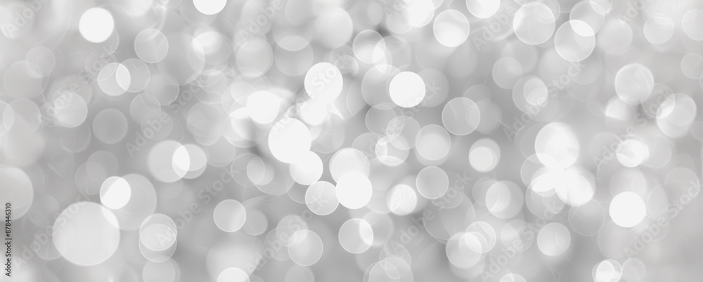 Abstract gray and white bokeh background with circular shapes Abstract gray and white bokeh background with circular shapes