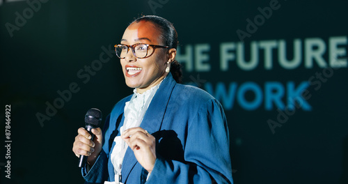 Black woman, mic and speech at conference for public speaking, presentation and international convention. Presenter, talking and seminar on stage for audience, motivation and global event with pitch