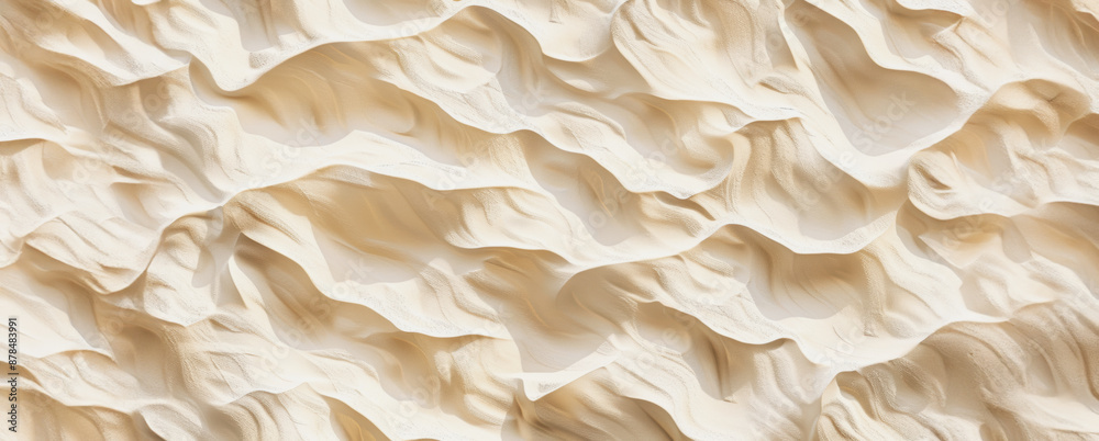 A detailed closeup of wavy sand dunes in the desert A detailed closeup of wavy sand dunes in the desert