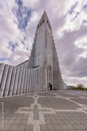 View of Hallgrimskirkja church in Reykjavik, Iceland with a cloudy sky