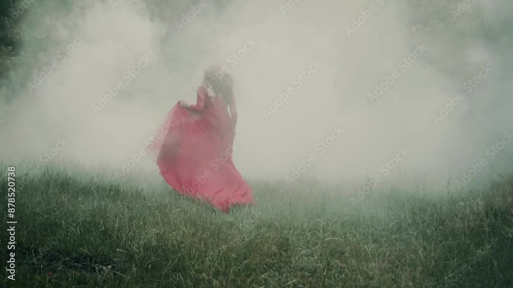 fantasy woman runs in thick fog gothic dark forest, red dress long train waving,fabric flies in slow motion. Scared mistery girl princess red hair, medieval romantic lady noblewoman, back rear view