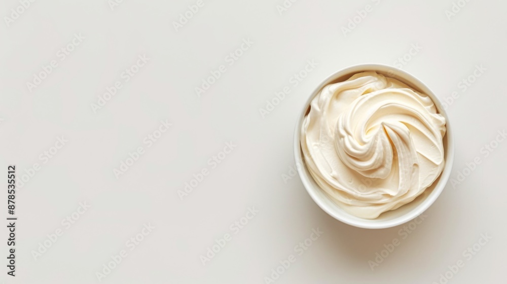 Cream in a bowl on a white background Cream in a bowl on a white background