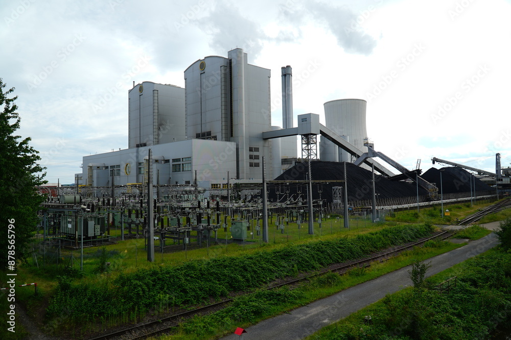 Coal fired power plant with stone coal dump. An old technology that is partly responsible for global warming. Hanover, Germany
