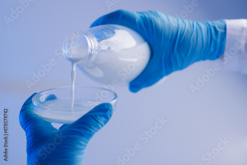 Quality control test of milk in laboratory. Dairy factory industry products