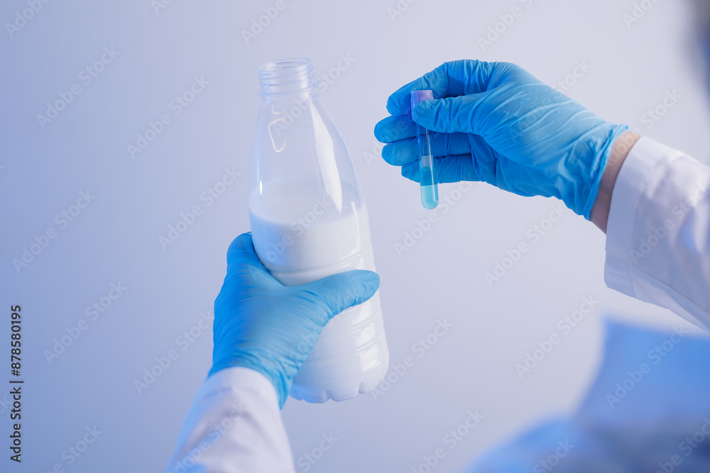 Quality control test of milk in laboratory. Dairy factory industry products Quality control test of milk in laboratory. Dairy factory industry products
