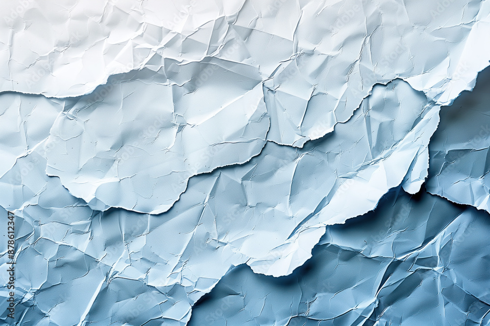 Fototapeta premium Abstract background of crumpled paper with shades of blue.