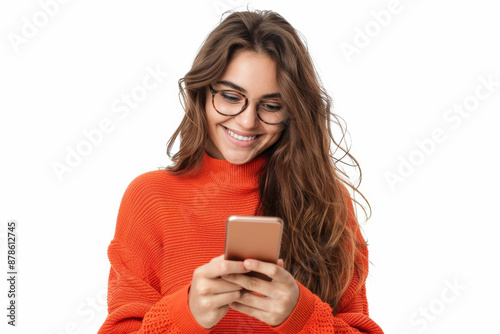 Young woman with glasses wearing an orange sweater, happily using her smartphone and smiling. Generated AI