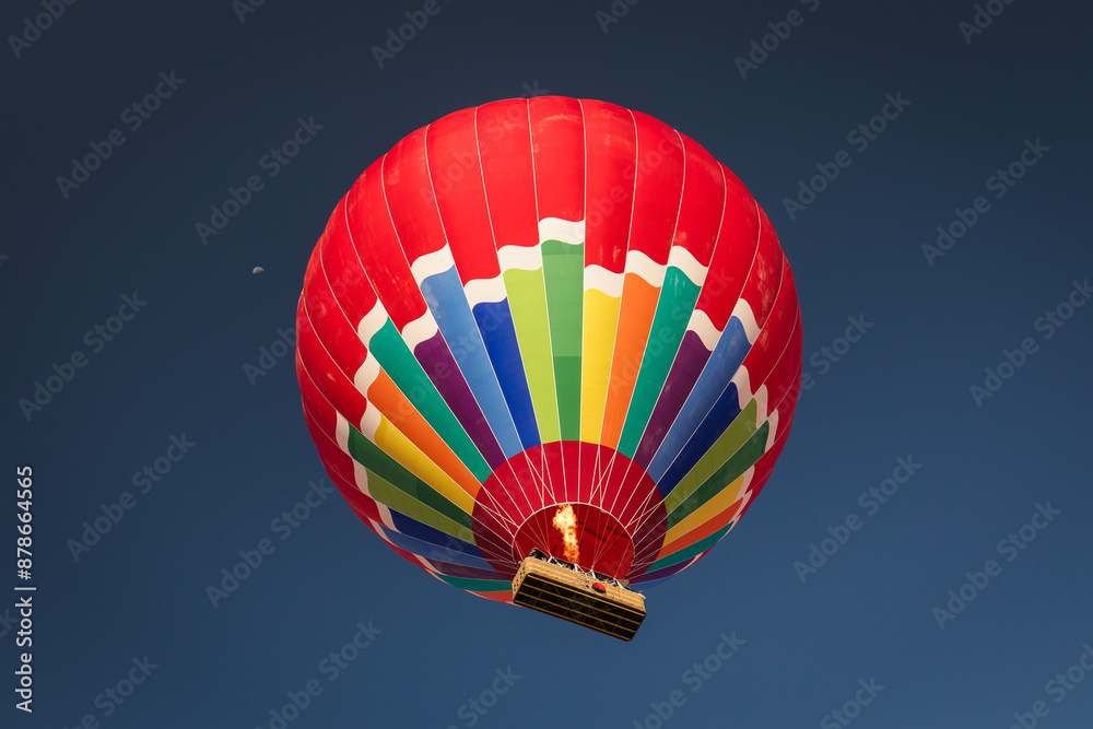 Colorful hot air balloon flying in the air in Cappadocia, Turkey