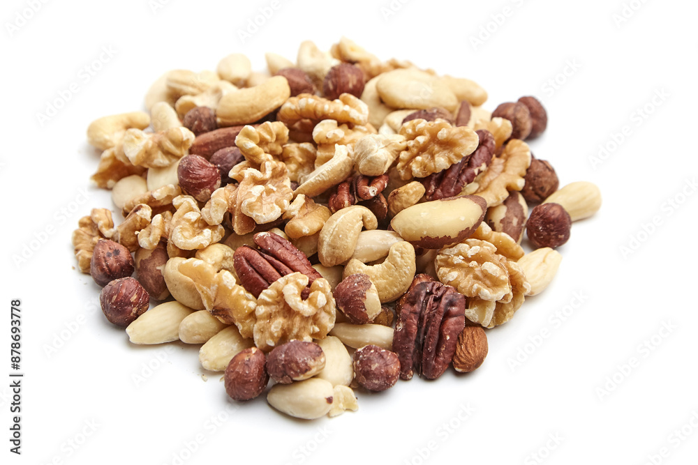 A variety of mixed nuts including walnuts, pecans, almonds, Brazil nuts, hazelnuts, and cashews isolated on a white background. Ideal for snacking and cooking