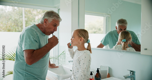 Fotografía Grandparent, kid and brushing teeth in bathroom for care, dental health and learning oral hygiene