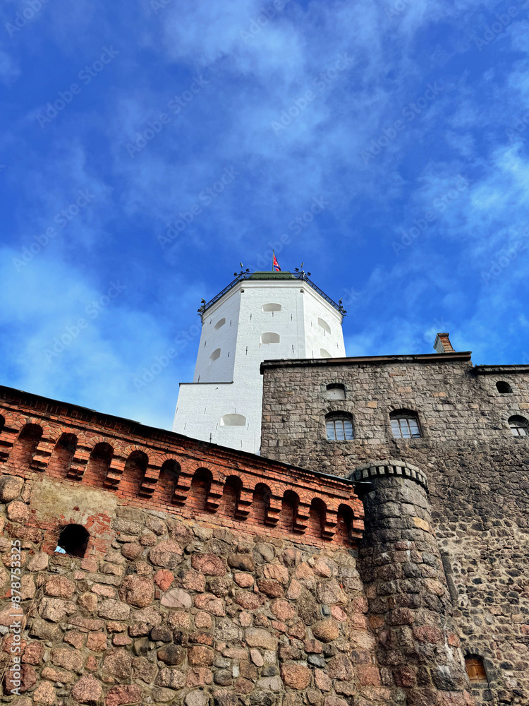 Vyborg Castle in the Sunshine - Scenic Vertical View from the Island Grounds. . Leningrad region, Russia. High quality photo. Vyborg Castle in the Sunshine - Scenic Vertical View from the Island Grounds. . Leningrad region, Russia. High quality photo.