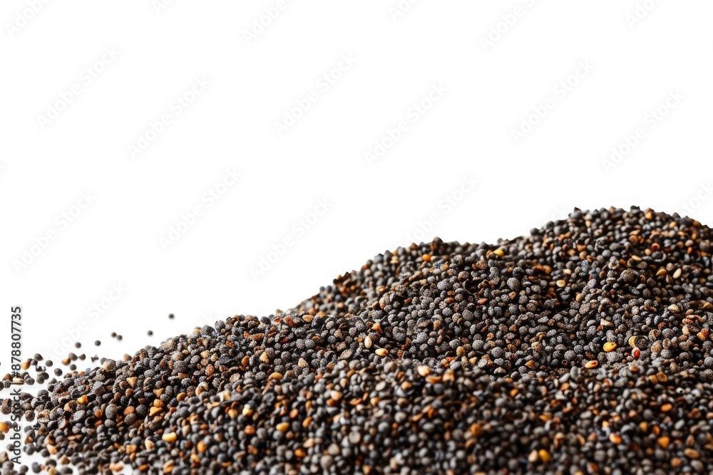 A close-up shot of a pile of mustard seeds on a white surface A close-up shot of a pile of mustard seeds on a white surface