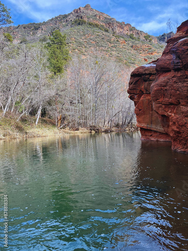 red rock in the river photo