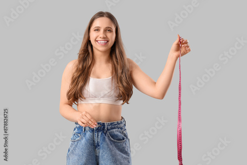 Pretty young woman in loose...