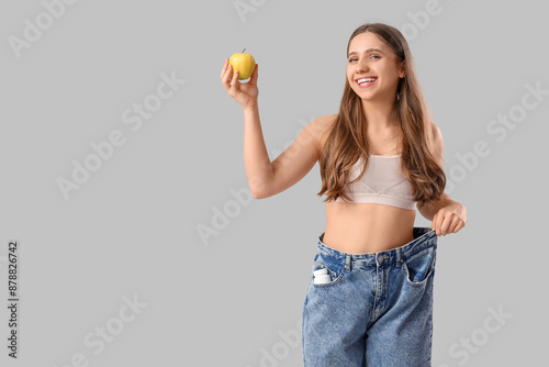Pretty young woman in loose...